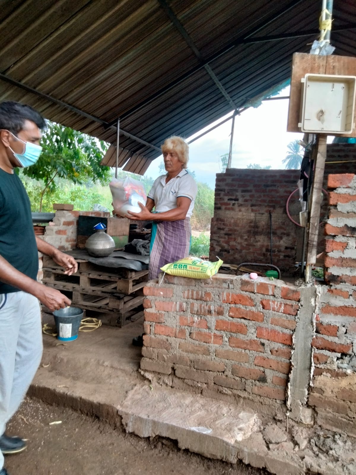 Nature View Foundation field volunteer delivering direct relief rations